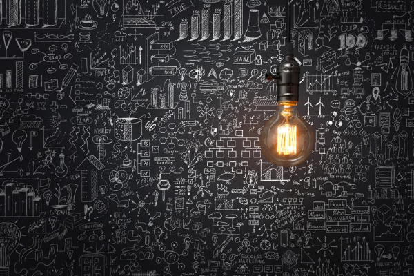 lightbulb in the middle of a mass of ideas.